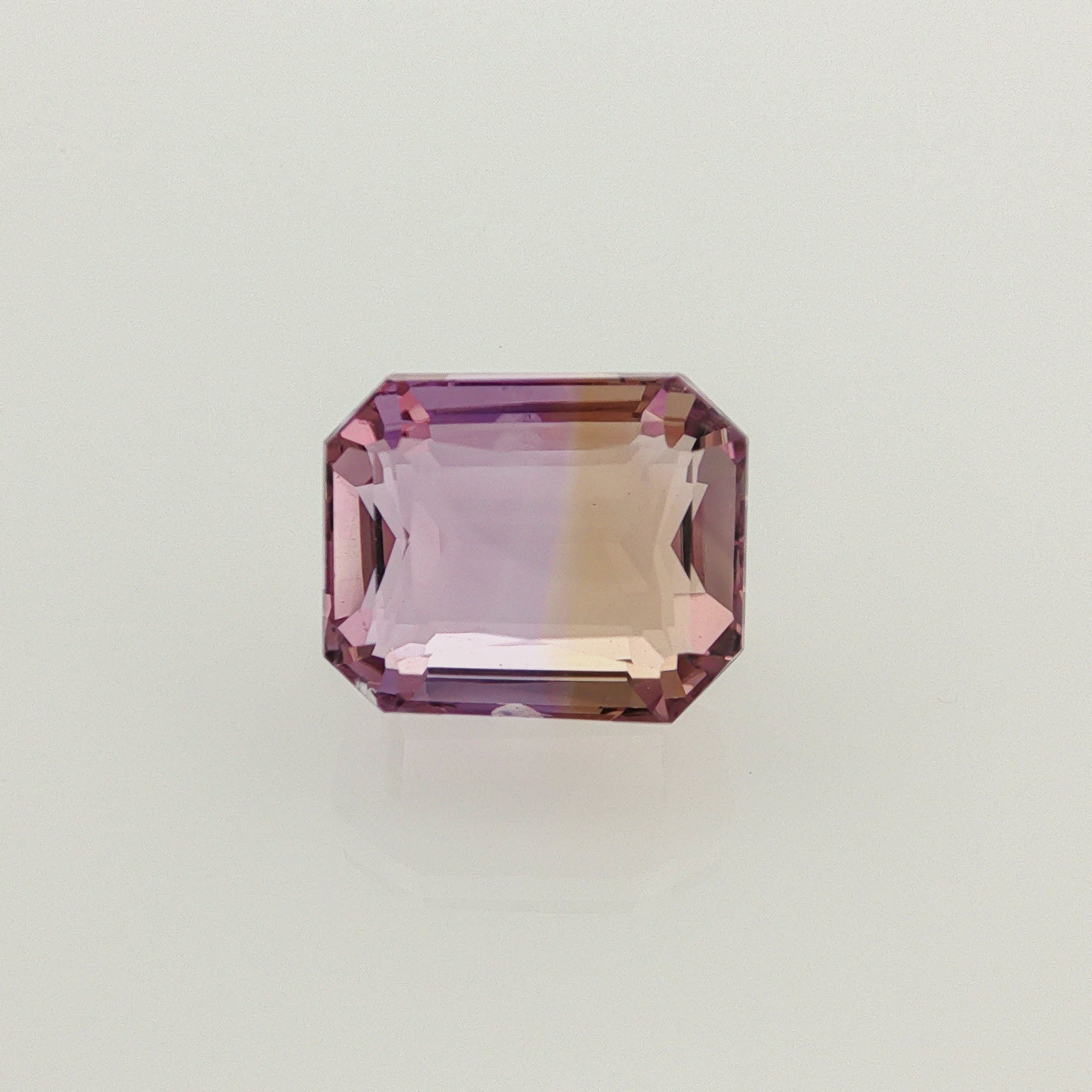 Natural ametrine, bicolor - purple / yellow, octagon cut, 12.86 ct, loose gemstone.