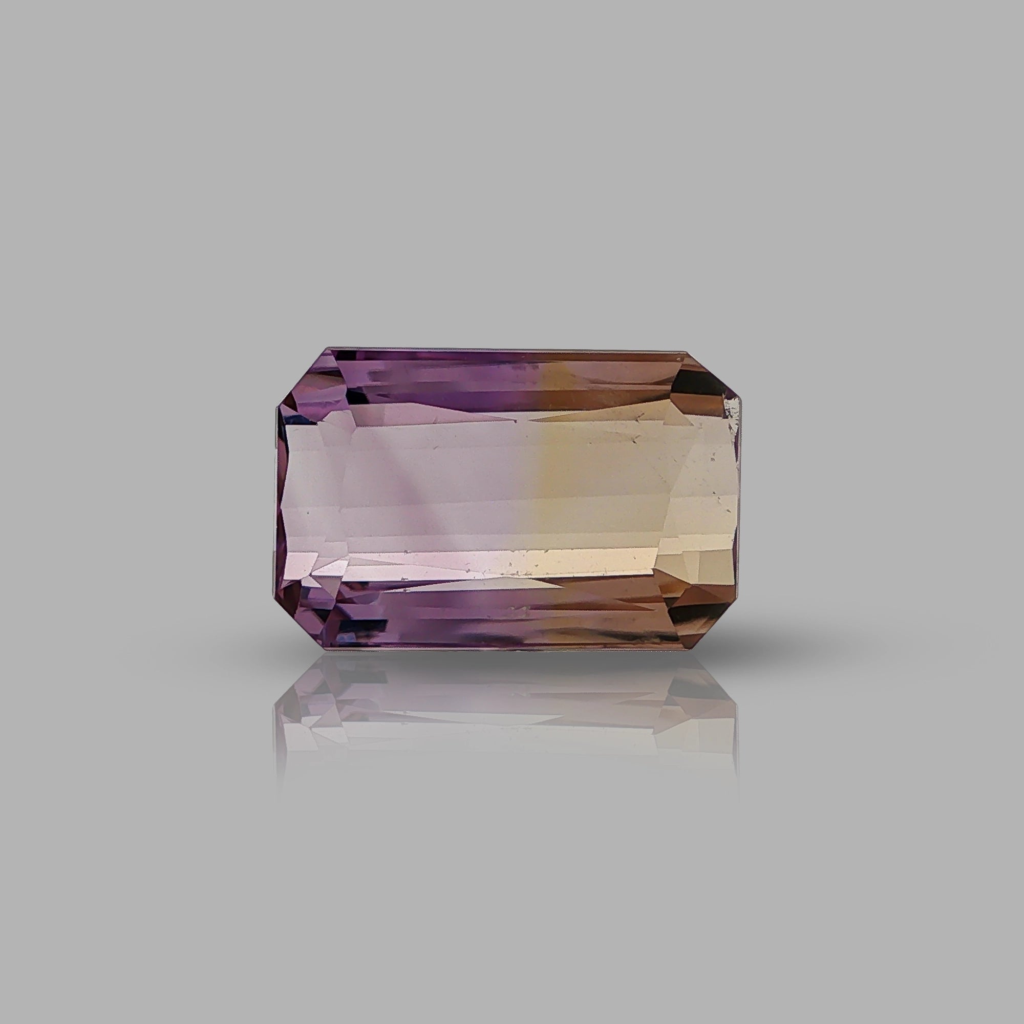 Natural ametrine, bicolor - purple / yellow, emerald cut, 12.94 ct, loose gemstone.
