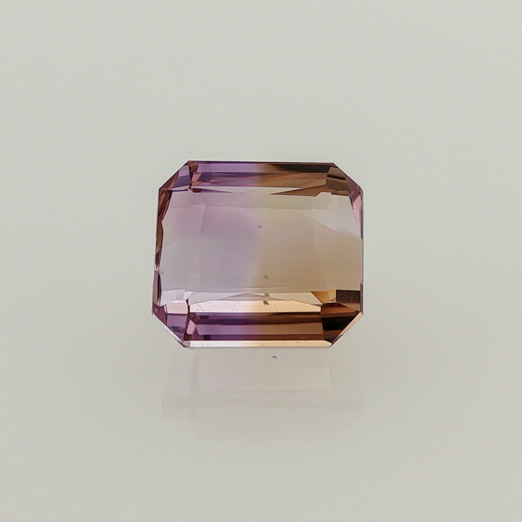 Natural ametrine, bicolor - purple / yellow, octagon cut, 13.27 ct, loose gemstone.