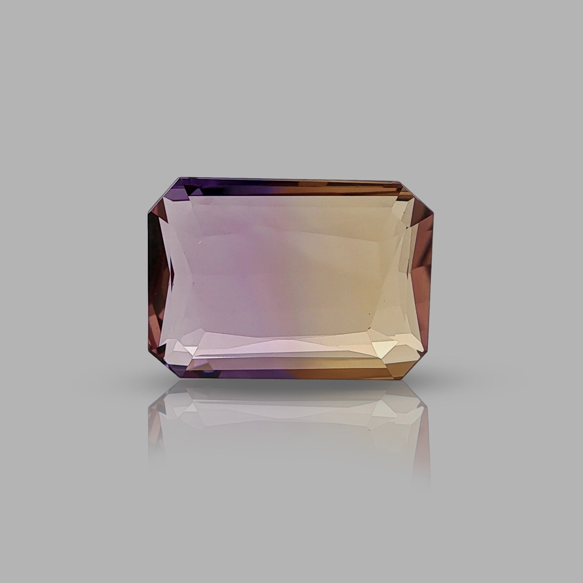 Natural ametrine, bicolor - vivid purple / vivid yellow, rectangle cut, 13.76 ct, loose gemstone.