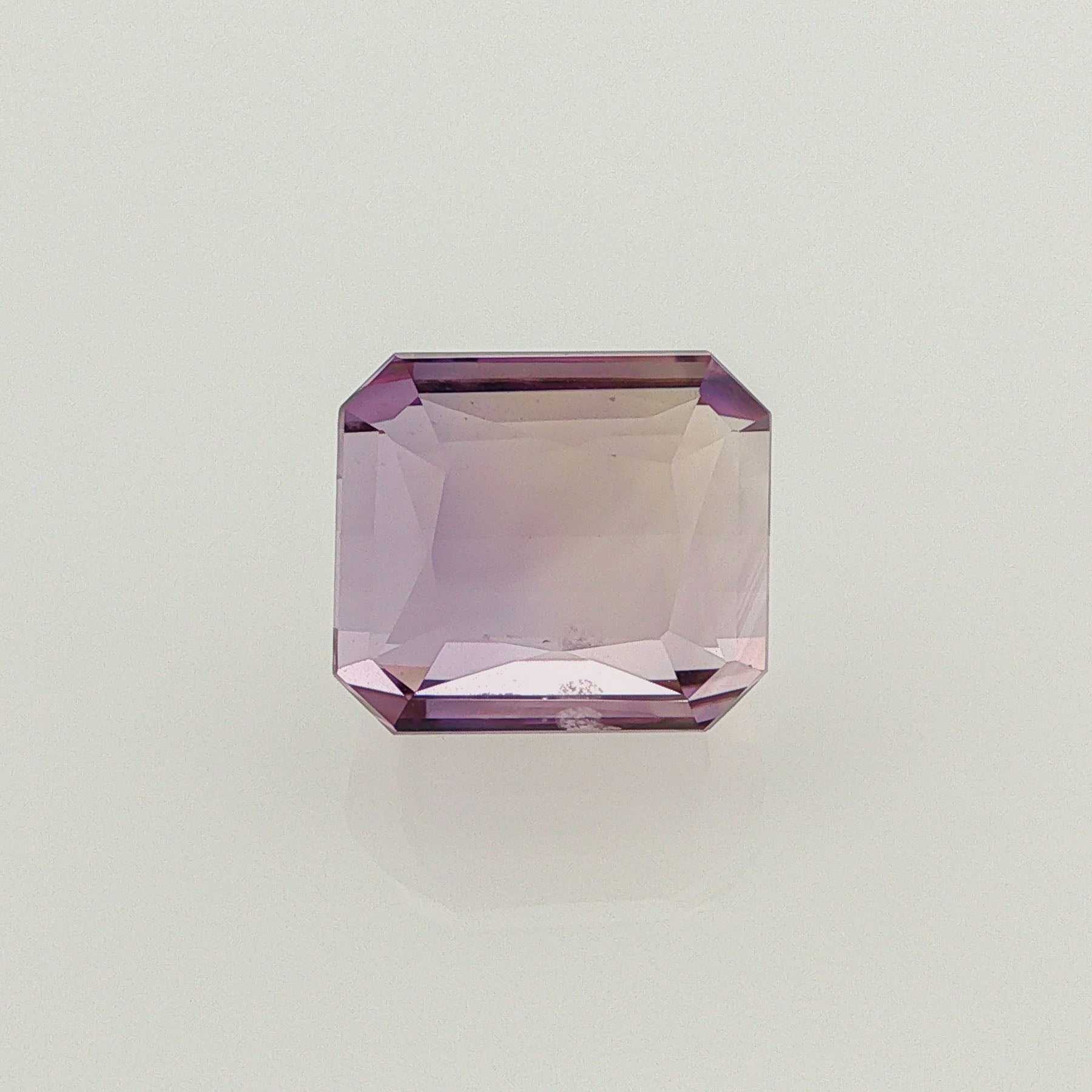 Natural ametrine, light purple / light yellow, octagon cut, 13.79 ct, loose gemstone.