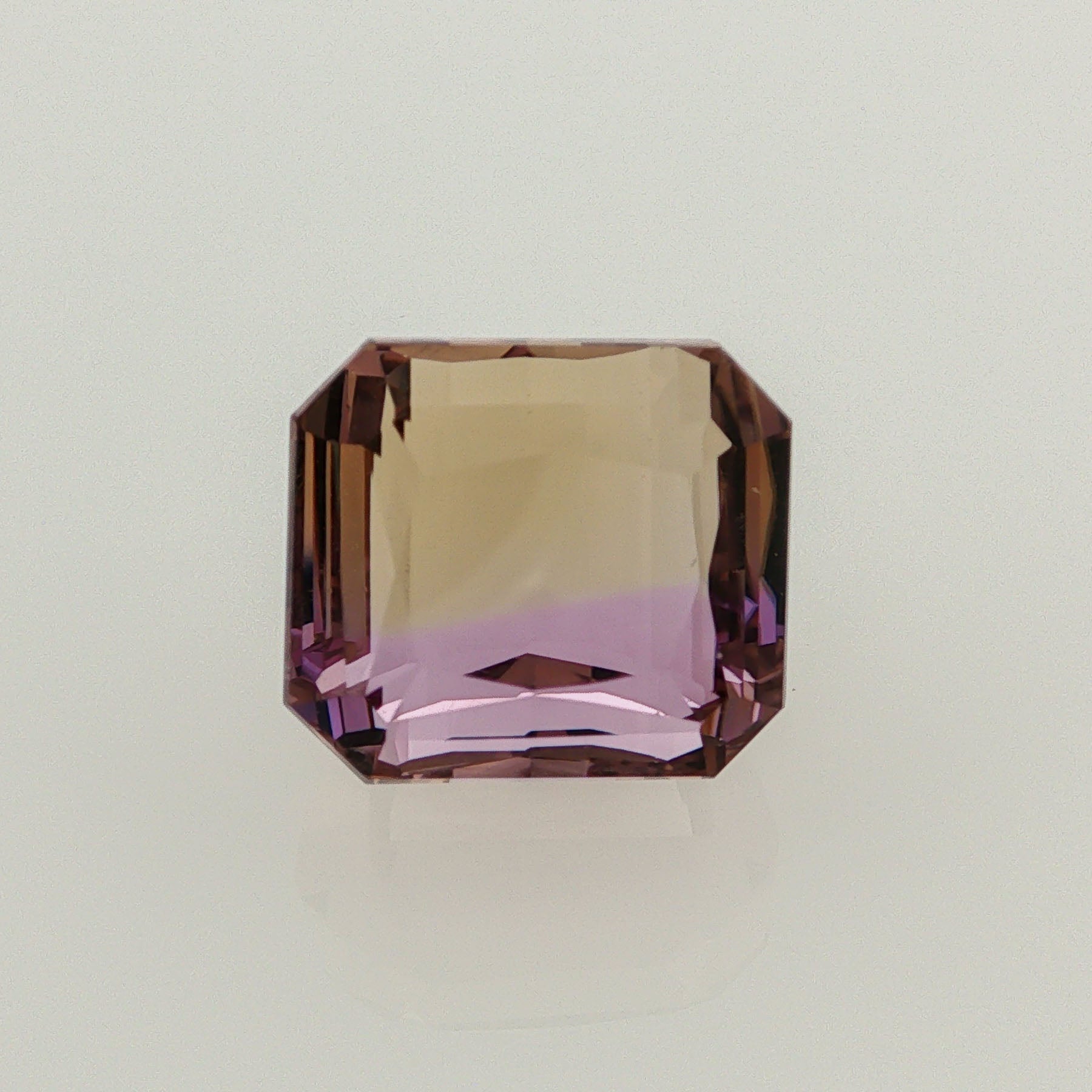 Natural ametrine, bicolor - purple / yellow, octagon cut, 13.82 ct, loose gemstone.