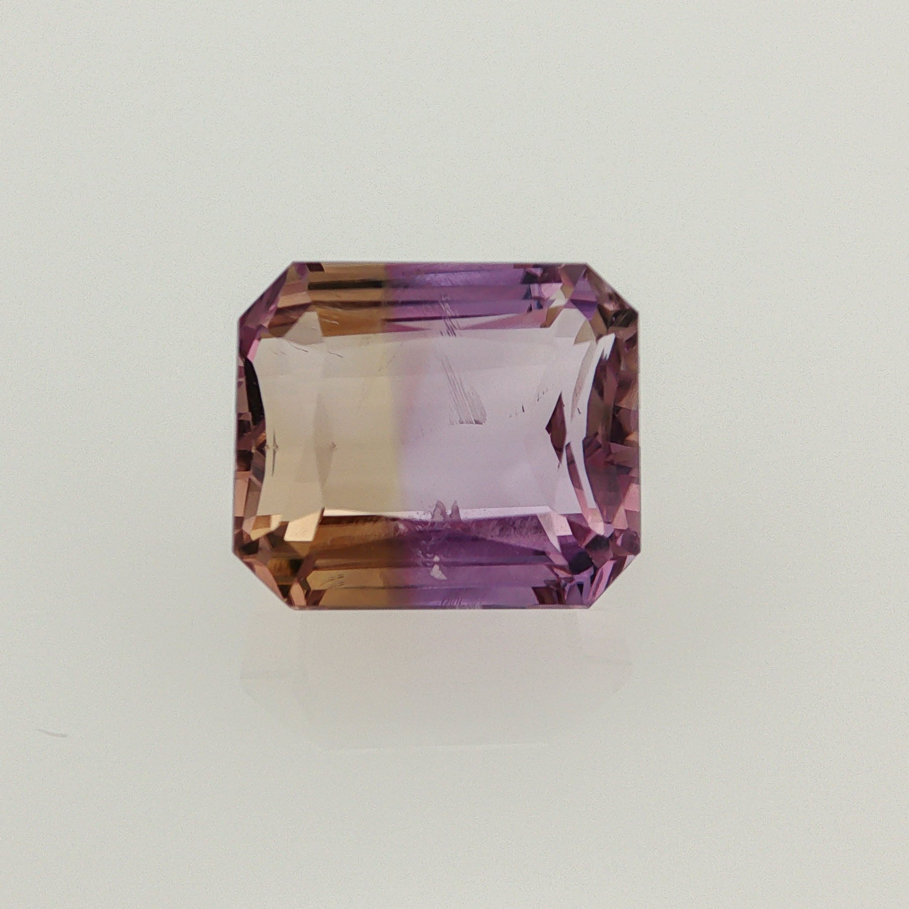 Natural ametrine, bicolor - purple / yellow, octagon cut, 14.78 ct, loose gemstone.