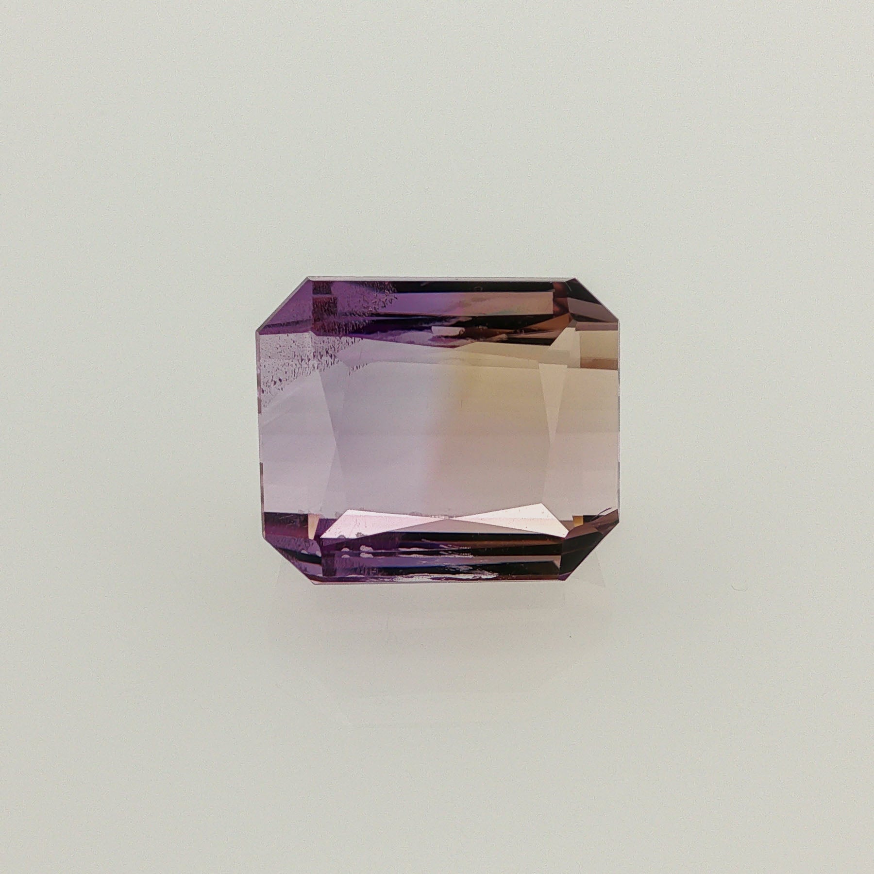 Natural ametrine, bicolor - purple / yellow, octagon cut, 14.79 ct, loose gemstone.