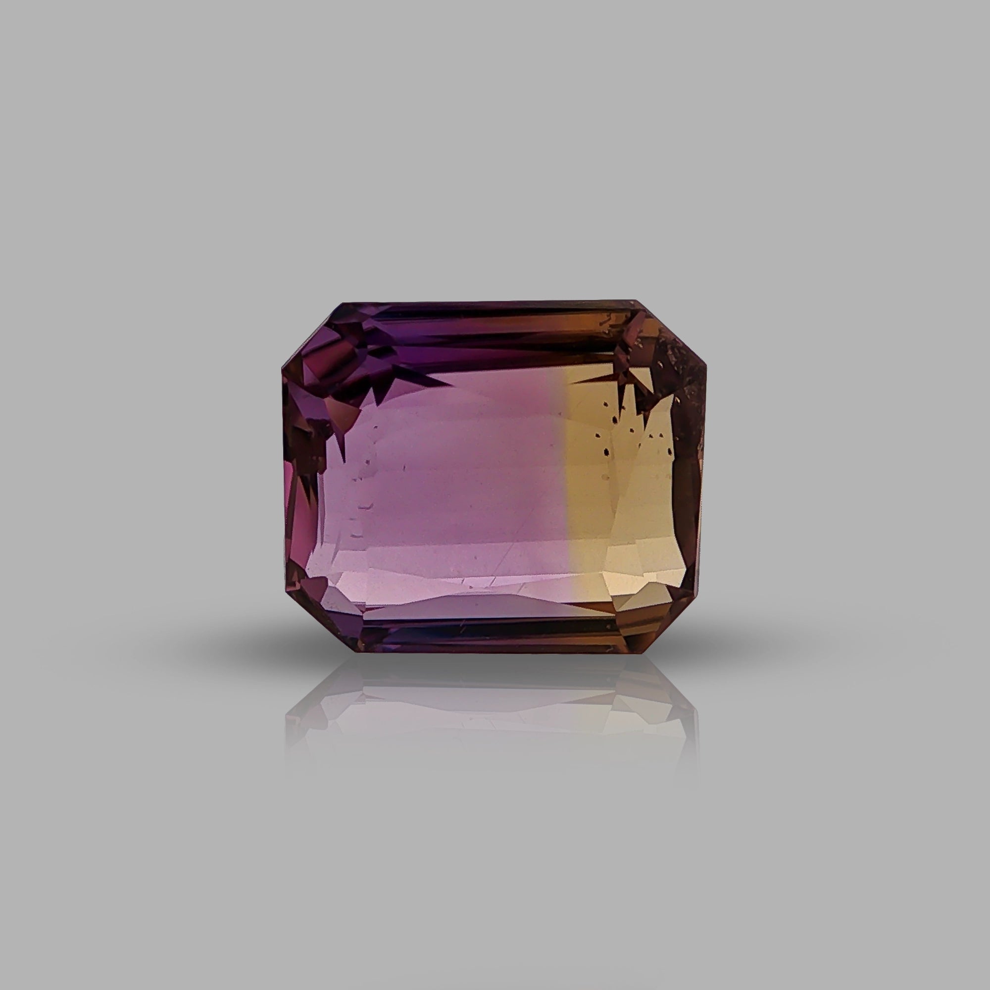 Natural ametrine, bicolor - purple / yellow, octagon cut, 15.68 ct, loose gemstone.