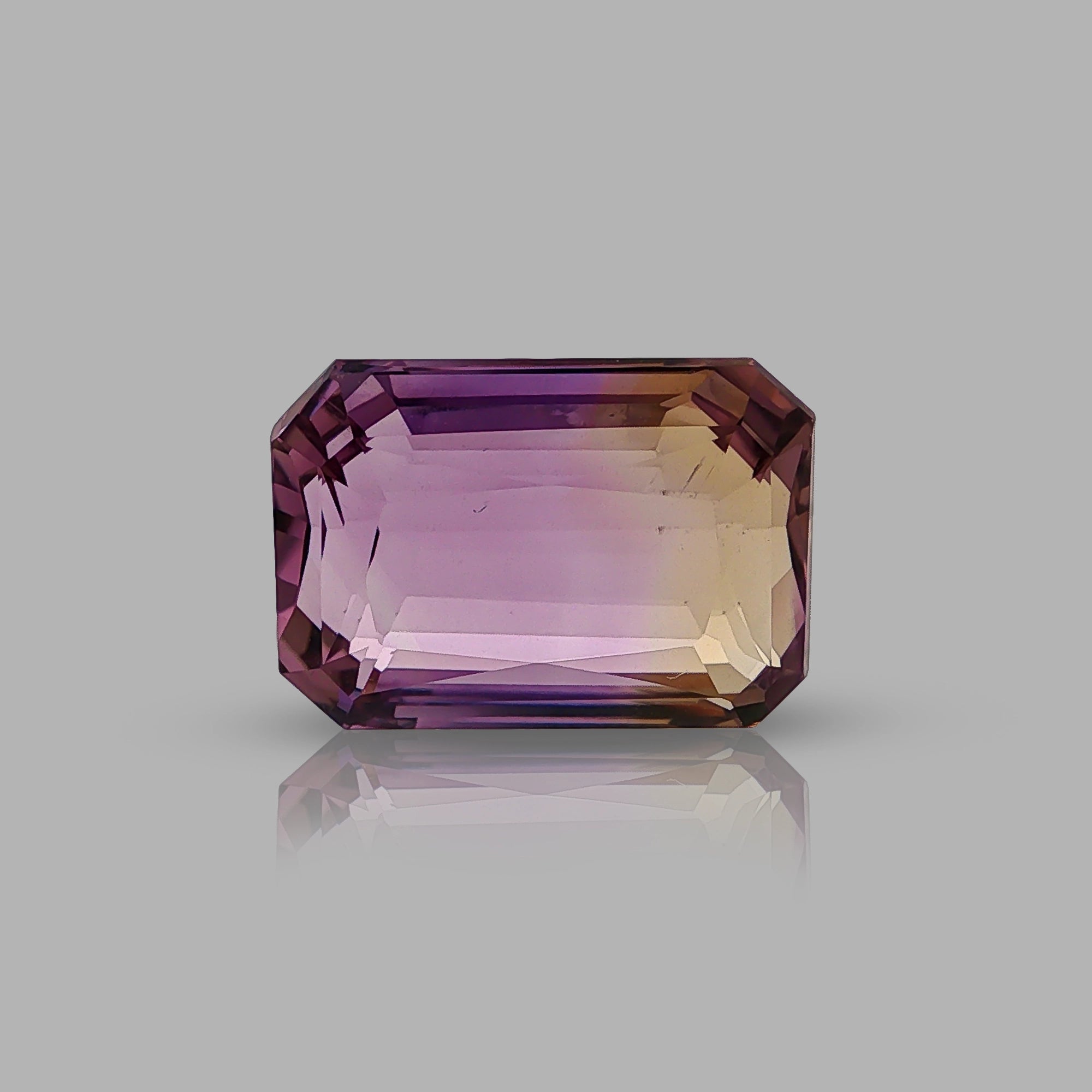 Natural ametrine, bicolor - vivid purple / vivid yellow, octagon cut, 16.07 ct, loose gemstone.