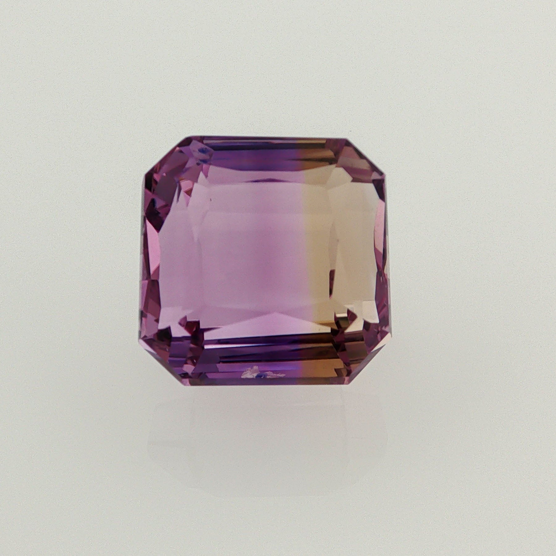 Natural ametrine, light purple / light yellow, octagon cut, 16.36 ct, loose gemstone.