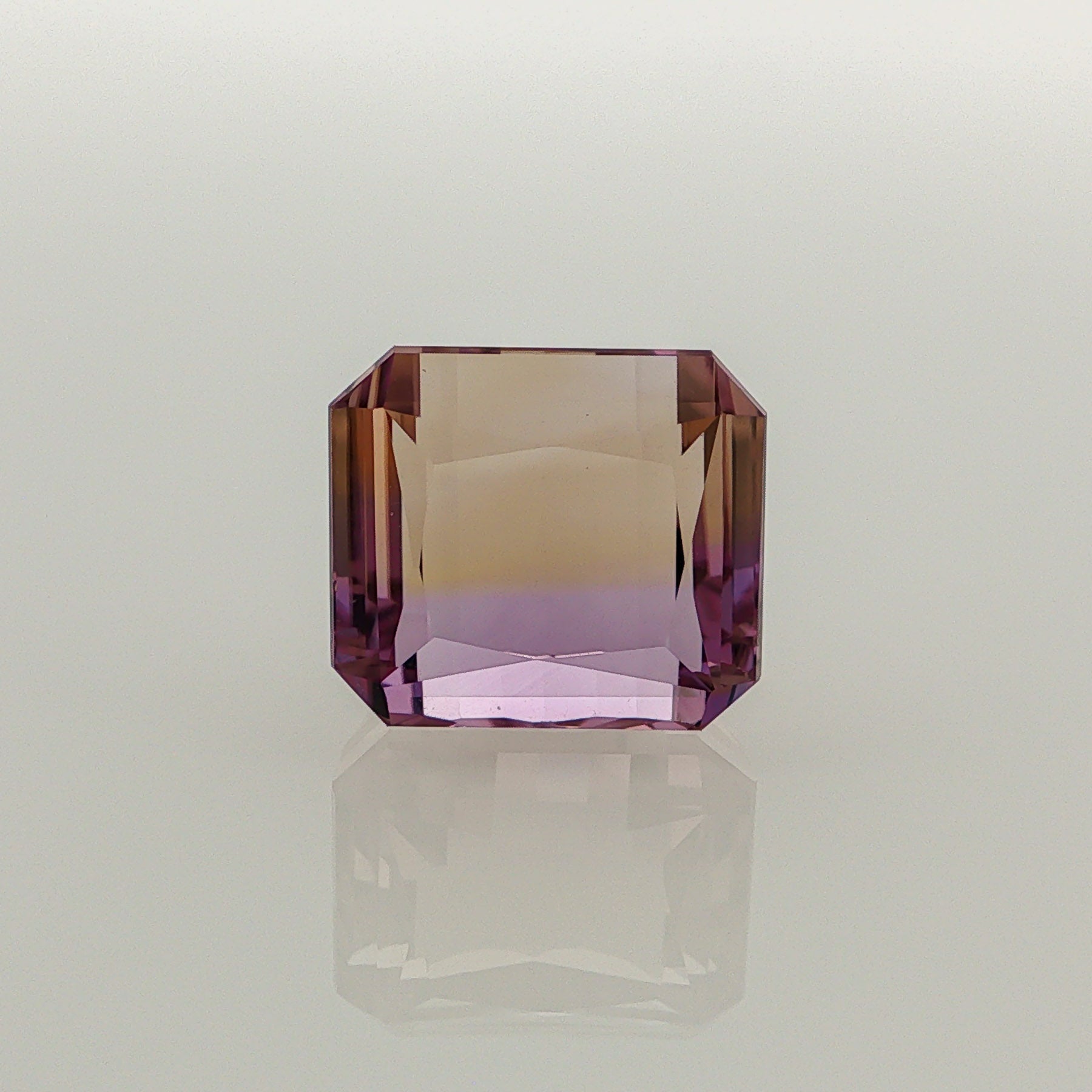 Natural ametrine, bicolor - purple / yellow, octagon cut, 16.38 ct, loose gemstone.