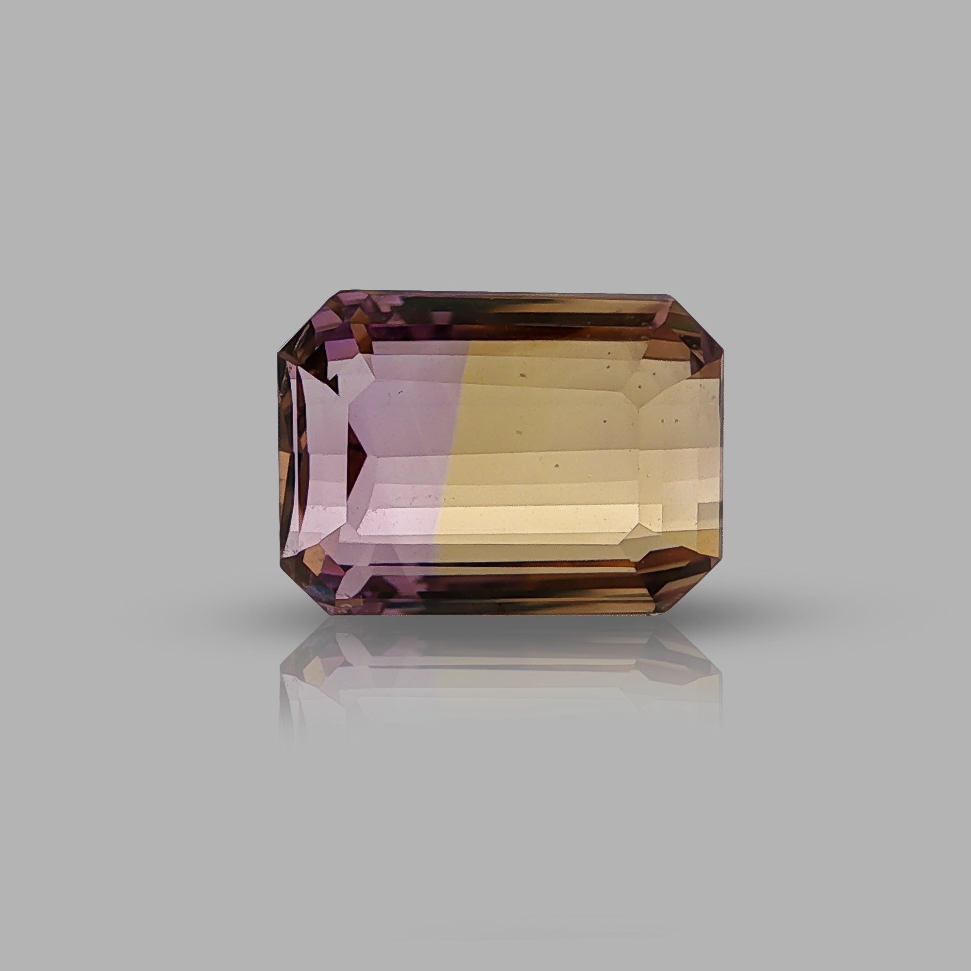 Natural ametrine, bicolor - purple / yellow, emerald cut, 16.68 ct, loose gemstone.