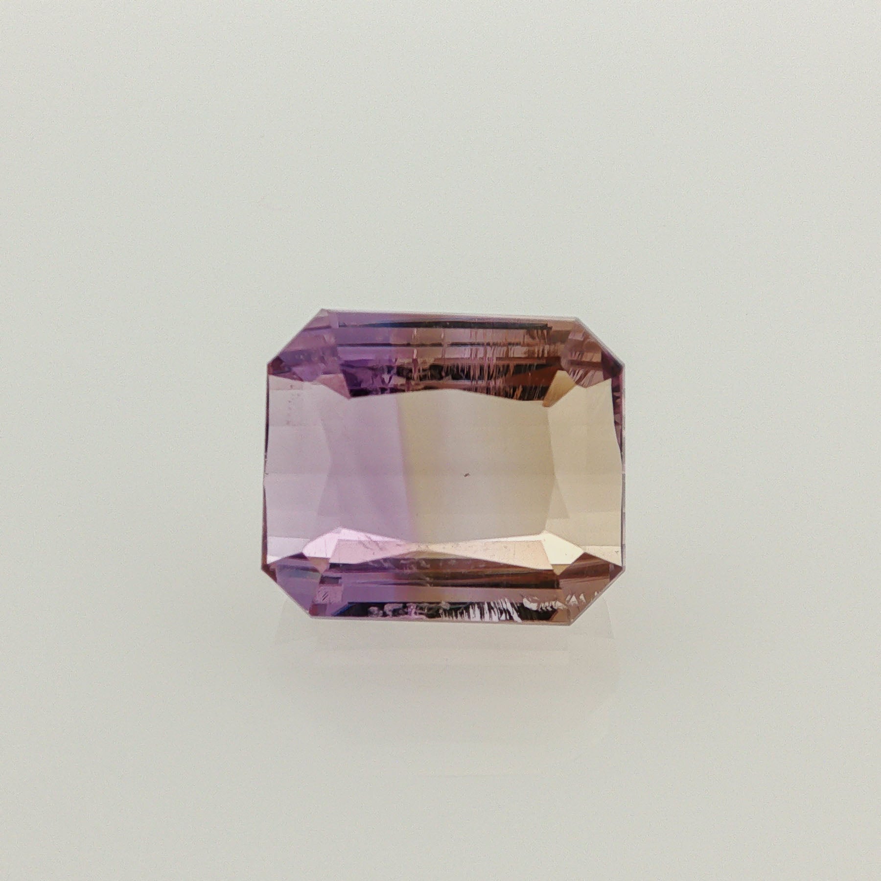 Natural ametrine, bicolor - purple / yellow, octagon cut, 17.01 ct, loose gemstone.