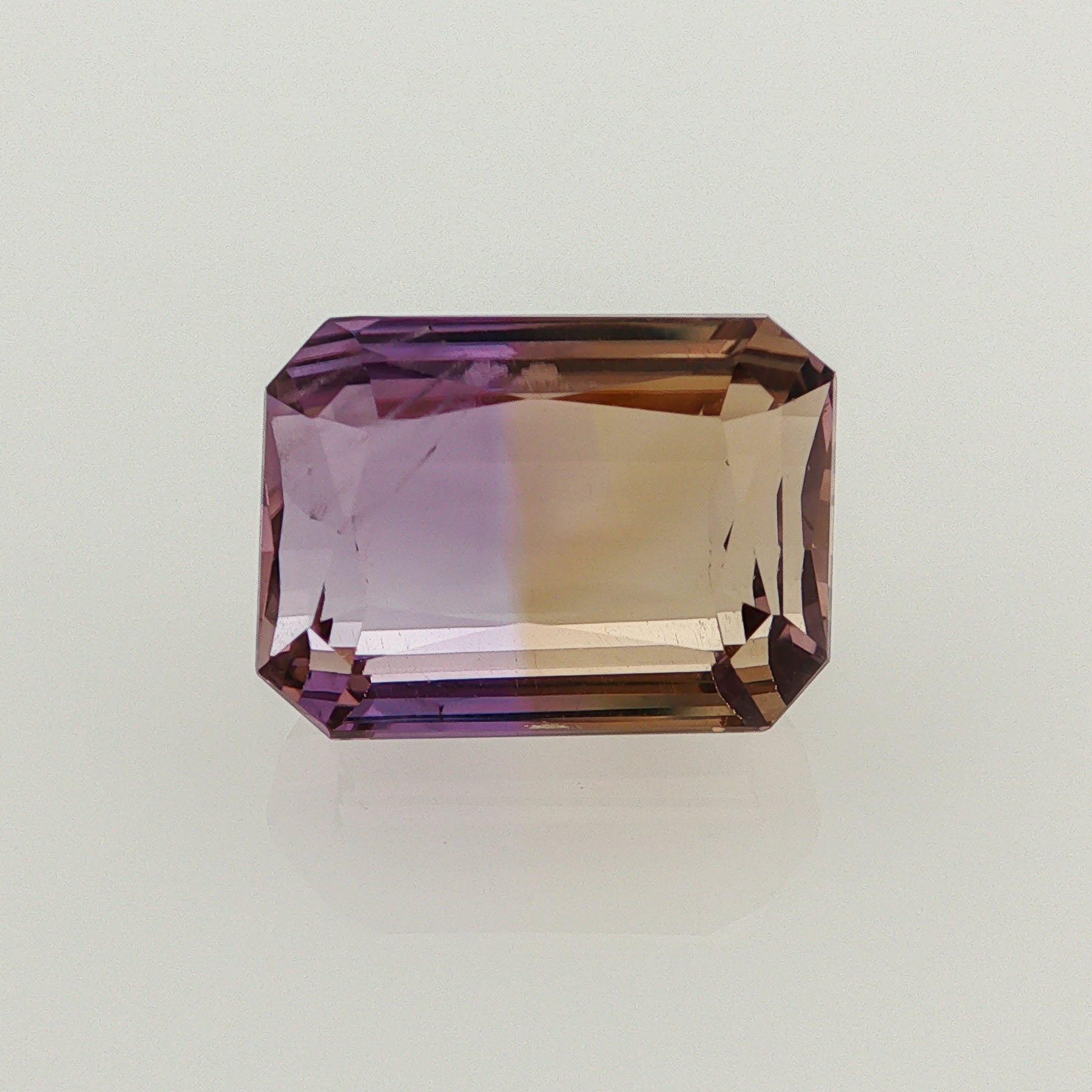Natural ametrine, bicolor - vivid purple / vivid yellow, octagon cut, 17.18 ct, loose gemstone.