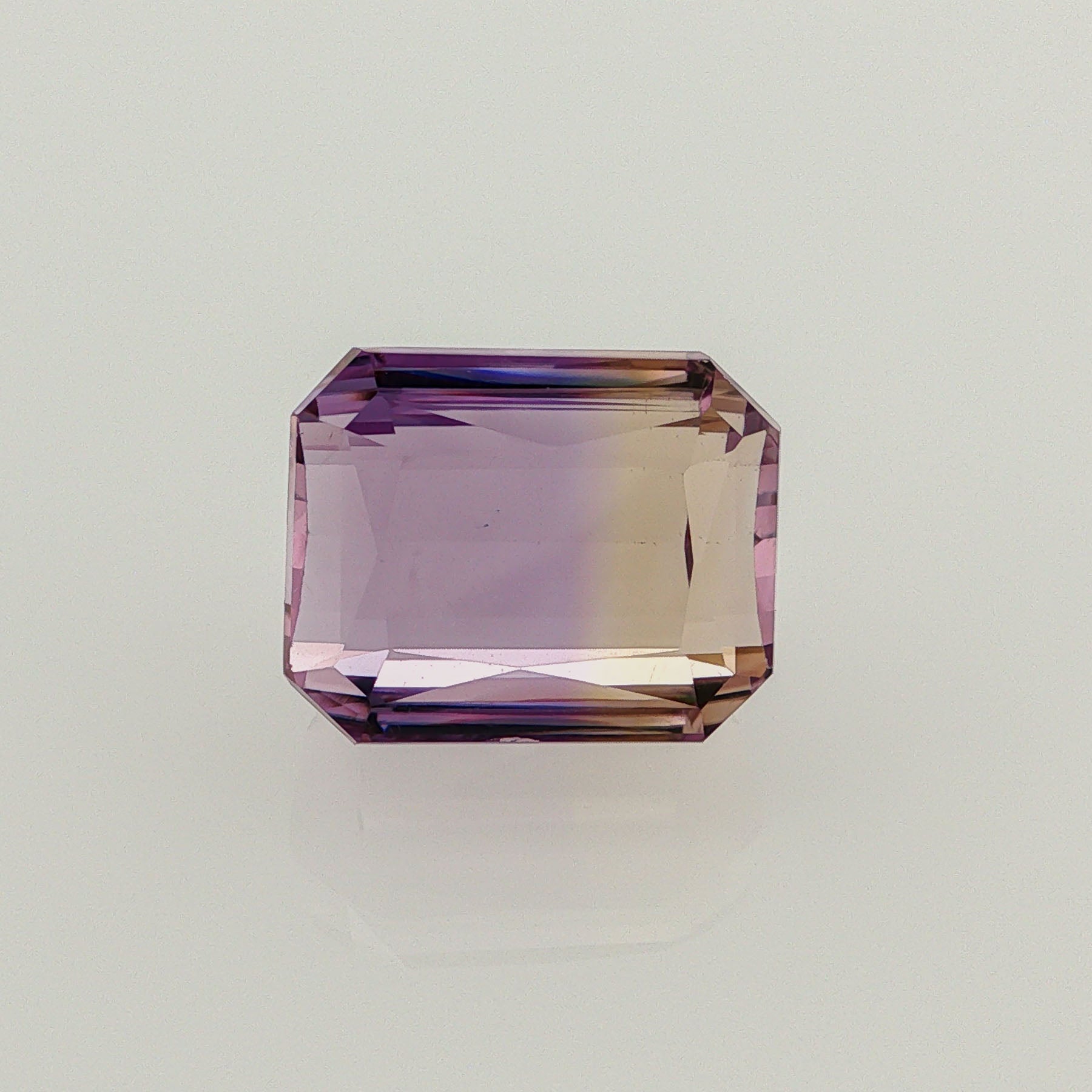 Natural ametrine, bicolor - purple / yellow, octagon cut, 17.85 ct, loose gemstone.