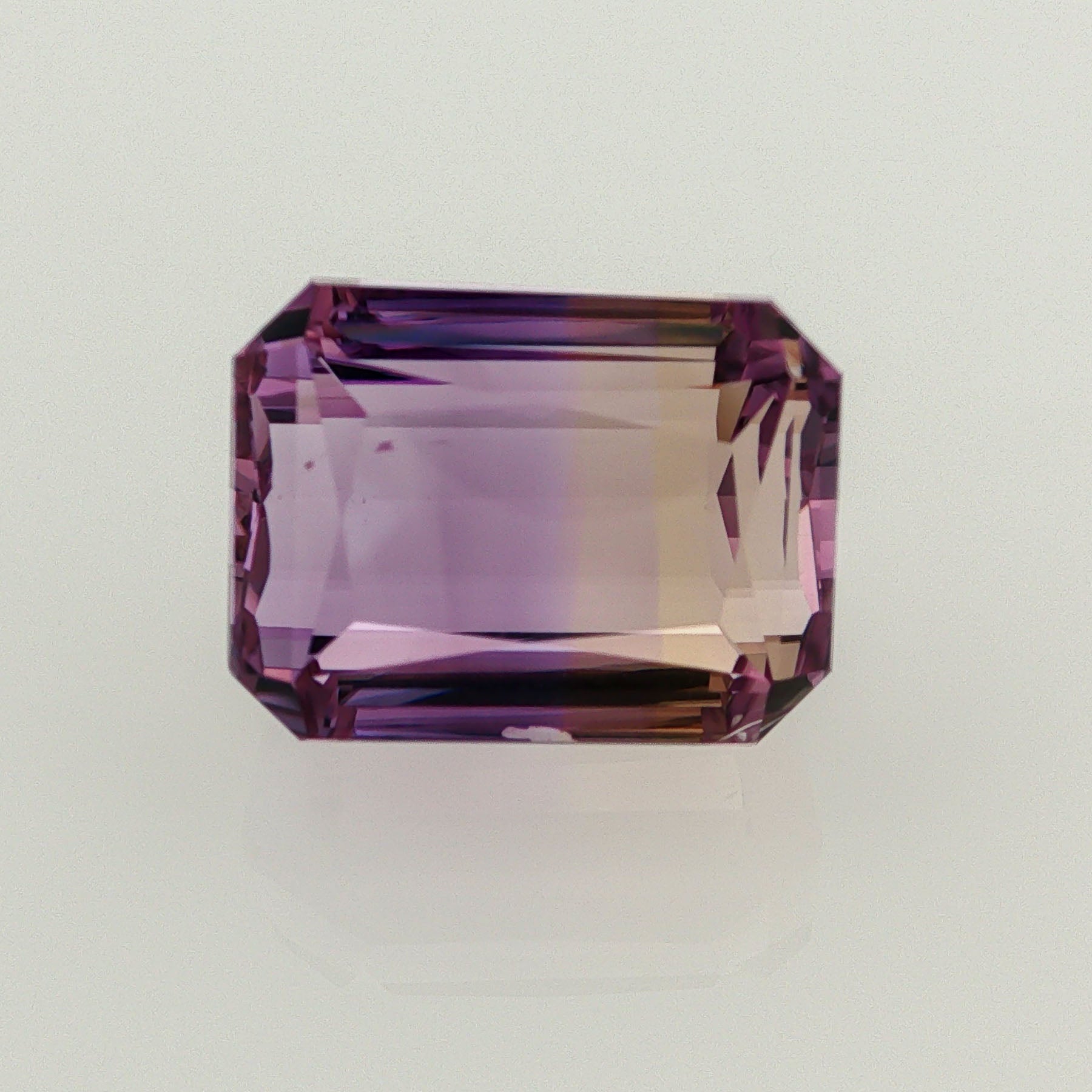 Natural ametrine, bicolor - vivid purple / vivid yellow, octagon cut, 18.28 ct, loose gemstone.