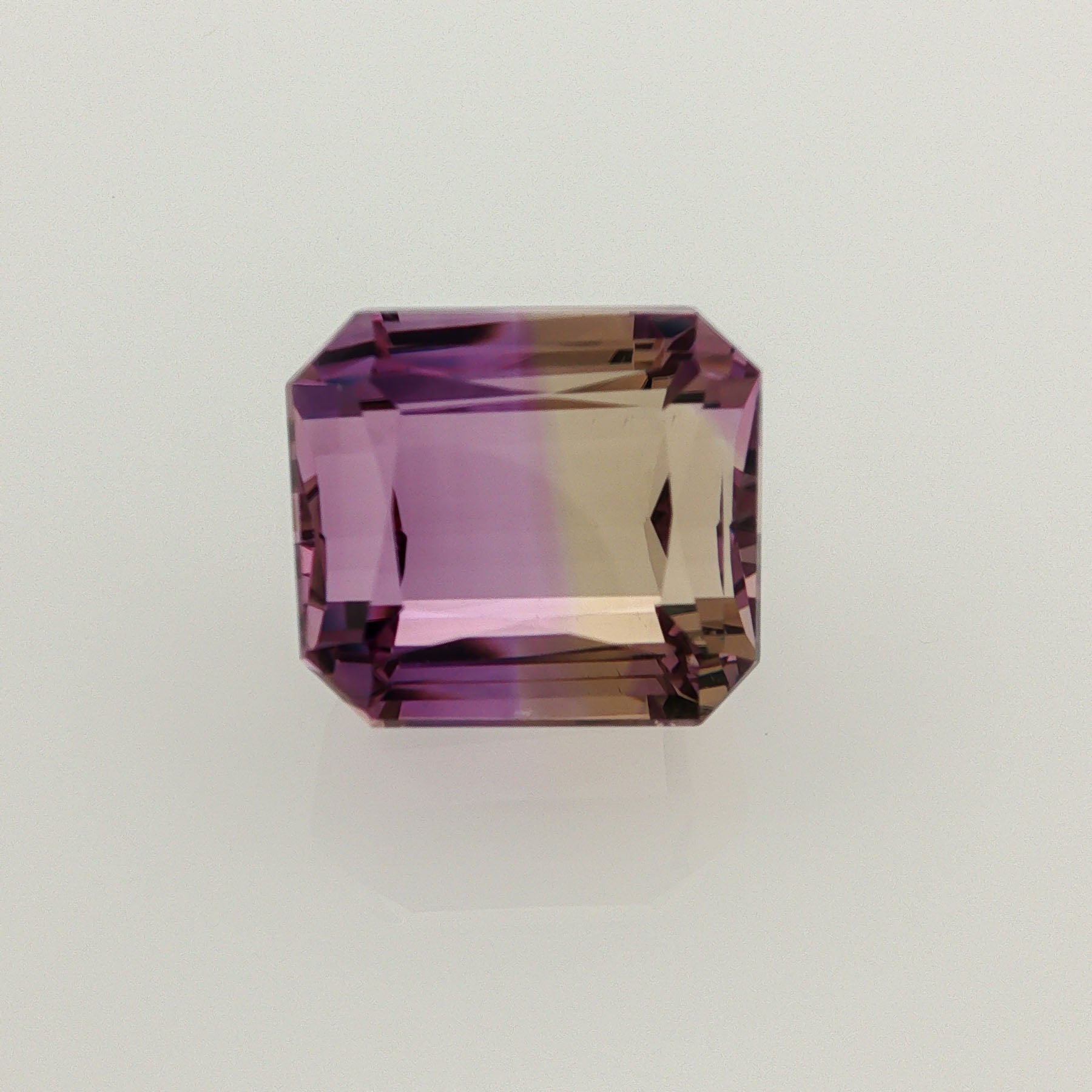 Natural ametrine, bicolor - purple / yellow, octagon cut, 20.32 ct, loose gemstone.