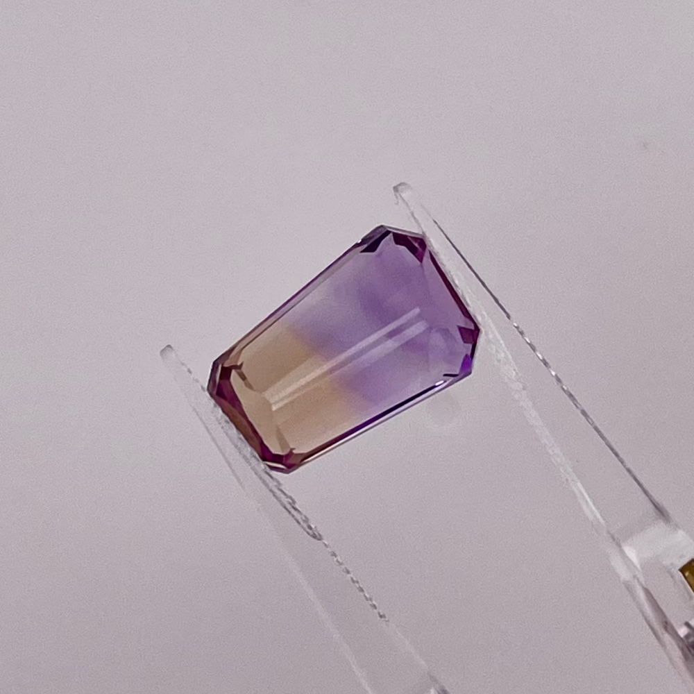 Natural Ametrine 5.92 carats, tapered baguette cut, purple and yellow bi-color gemstone, untreated