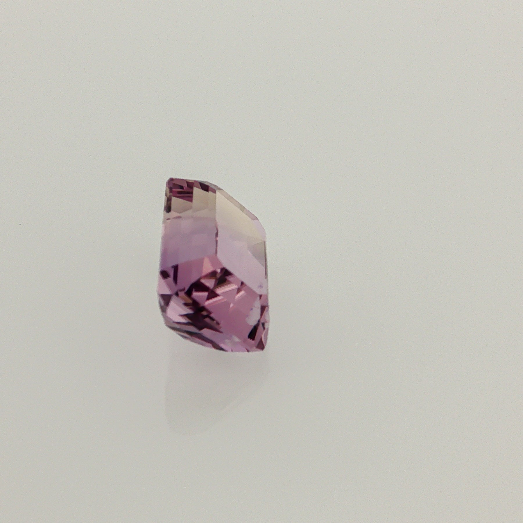 Natural ametrine, bicolor - purple / yellow, emerald cut, 7.67 ct, loose gemstone, view 4.