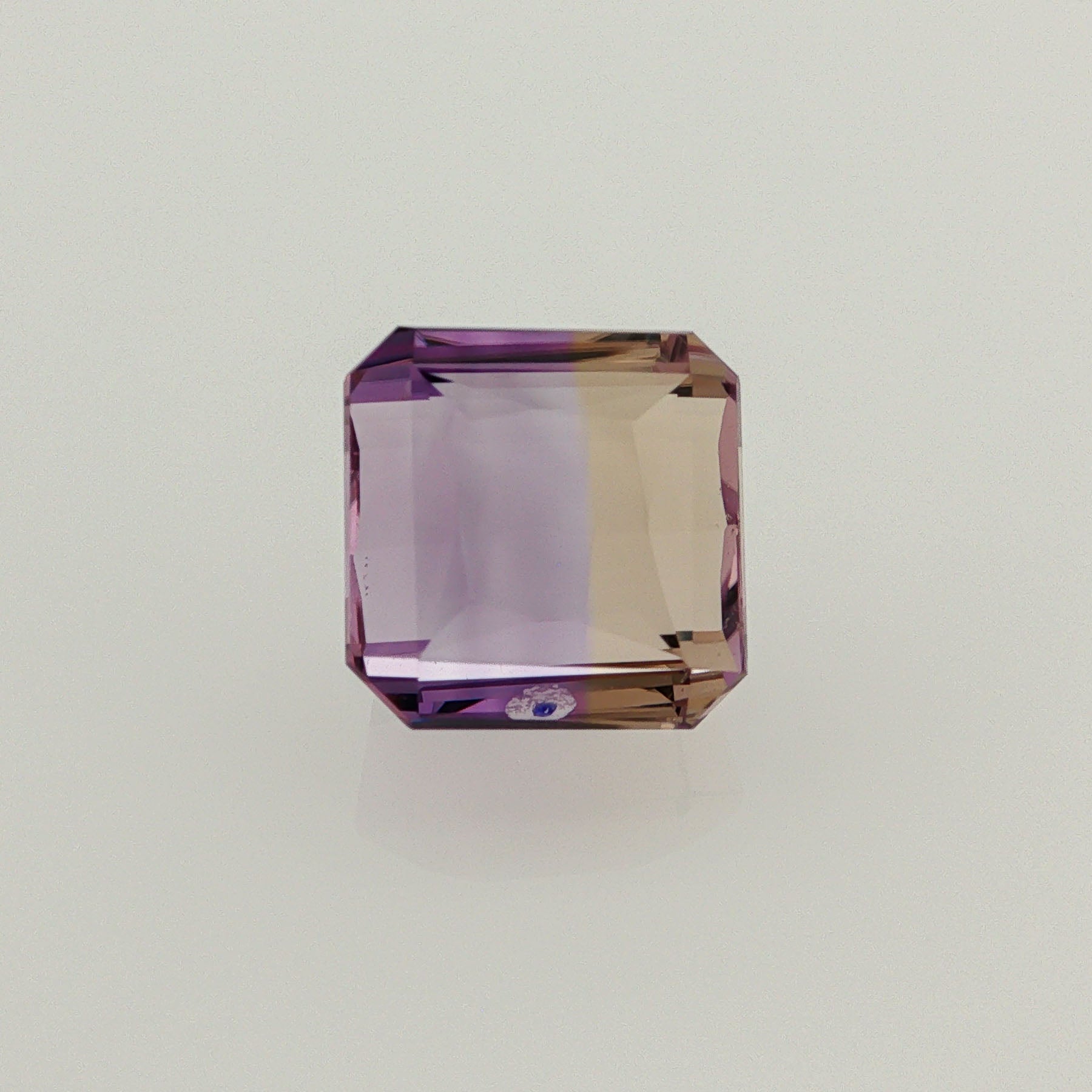 Natural ametrine, bicolor - purple / yellow, octagon cut, 7.76 ct, loose gemstone.