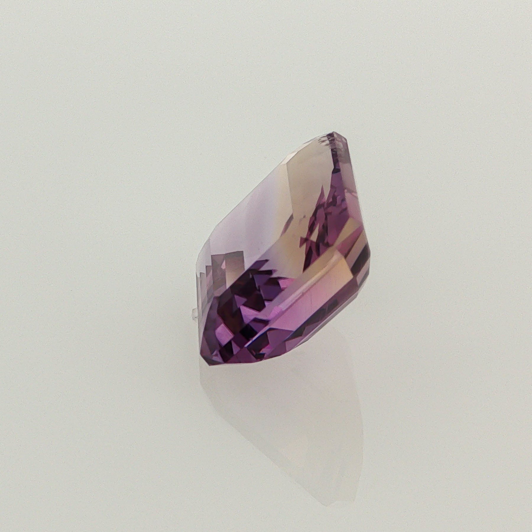 Natural ametrine, bicolor - vivid purple / very light yellow, emerald cut, 9.07 ct, loose gemstone, view 2.