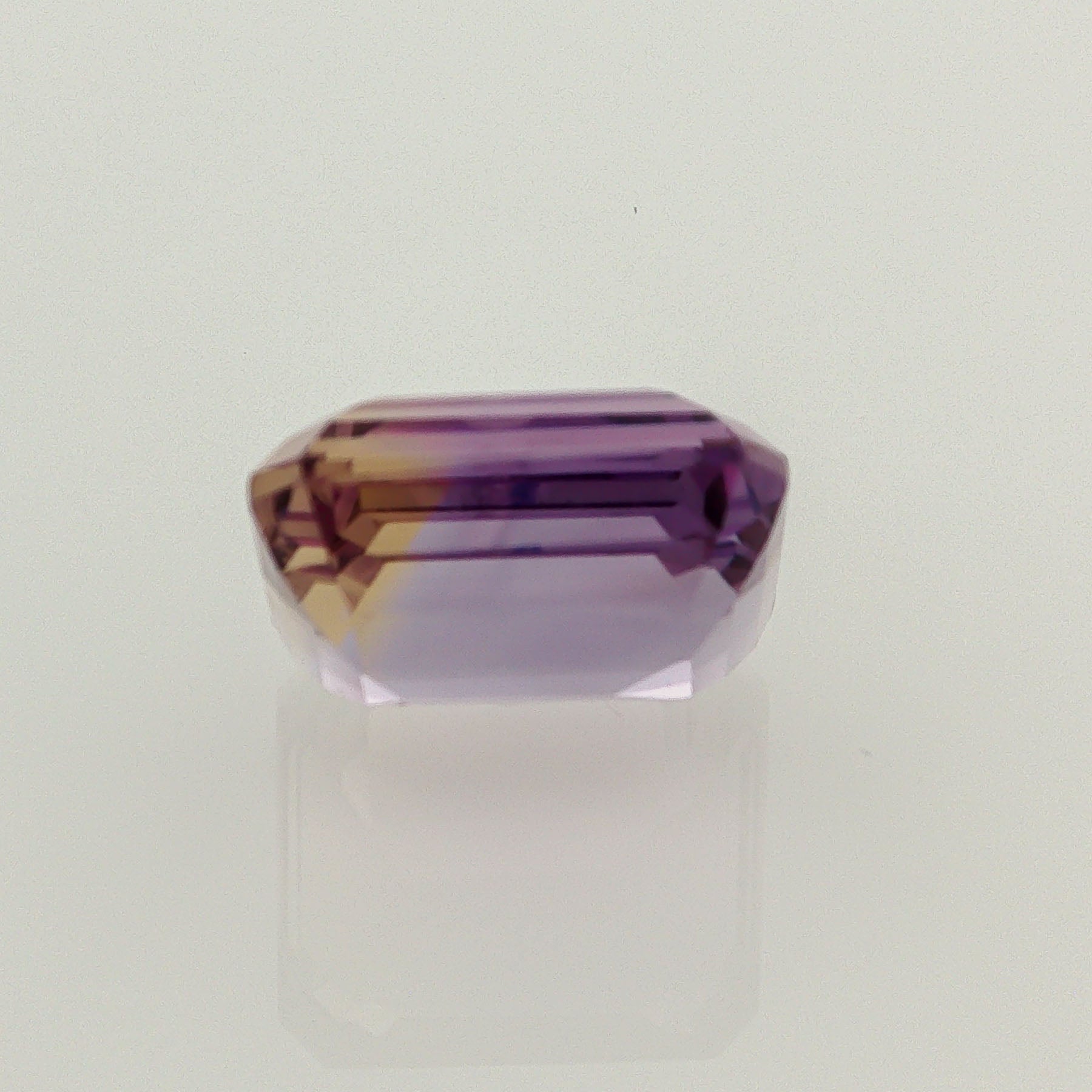 Natural ametrine, bicolor - vivid purple / yellow, emerald cut, 9.62 ct, loose gemstone, view 3.