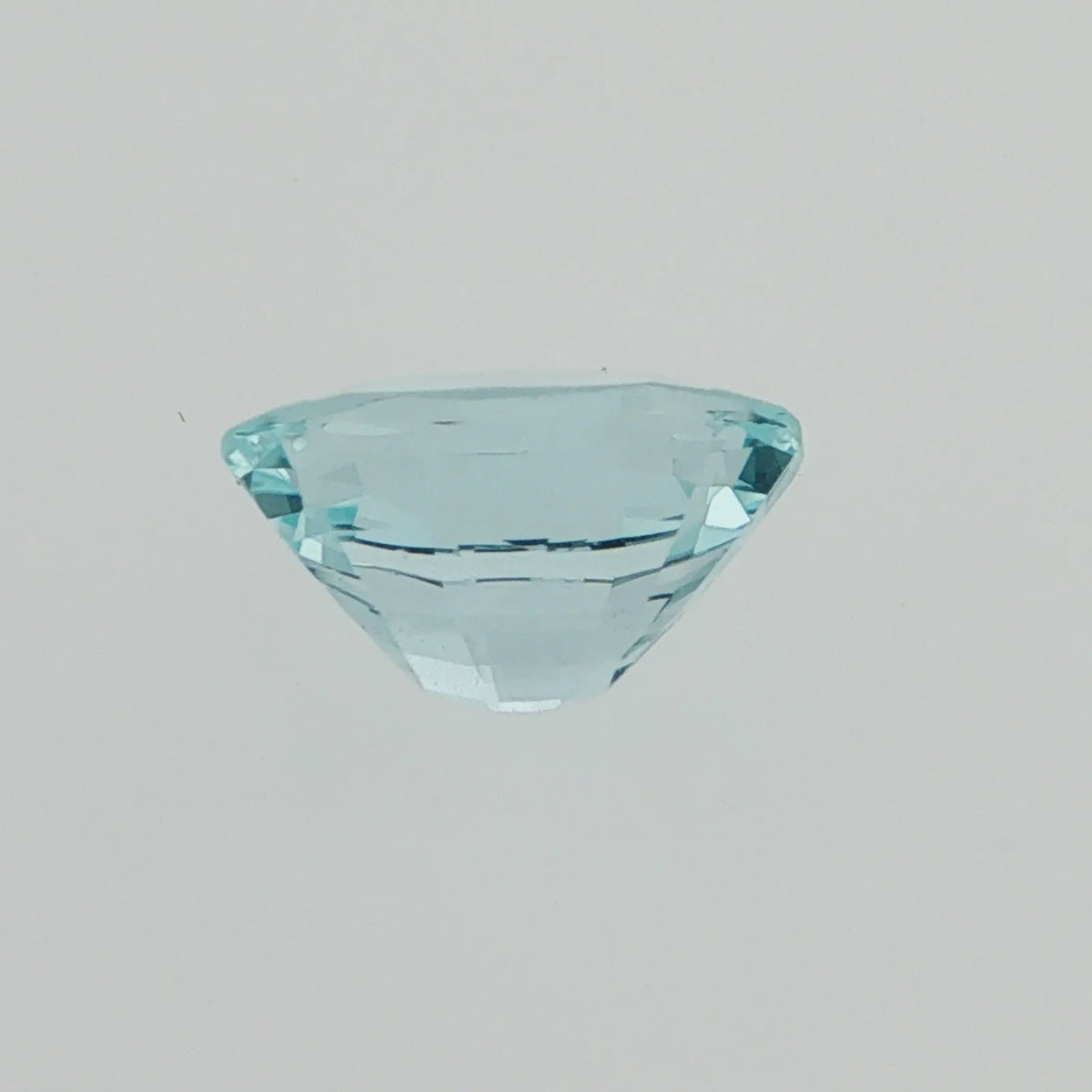 Natural untreated aquamarine, very light, slightly greenish blue, oval cut, 4.28 ct, loose gemstone, view 5.