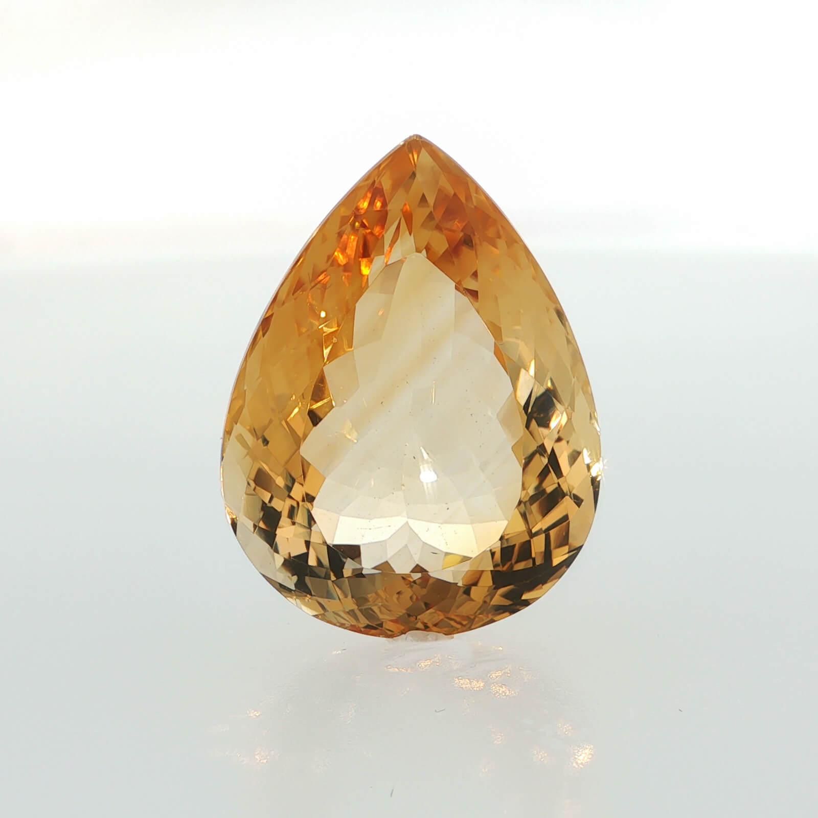 Natural citrine, 42.68 carats, pear cut, golden-yellow color, measuring 28.28 × 21.12 × 13.28 mm