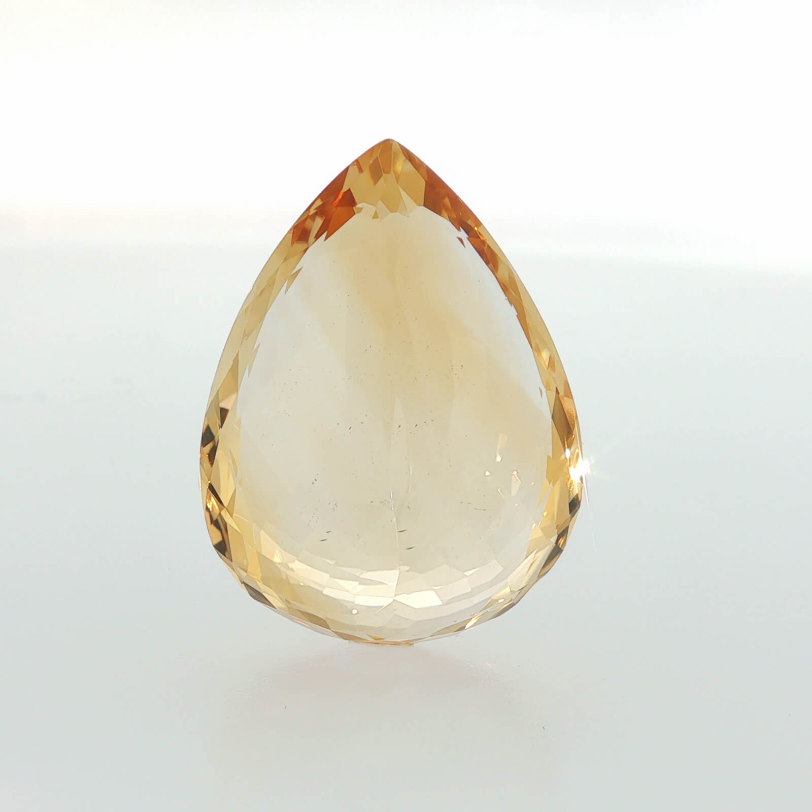 Natural citrine, 42.68 carats, pear cut, golden-yellow color, measuring 28.28 × 21.12 × 13.28 mm