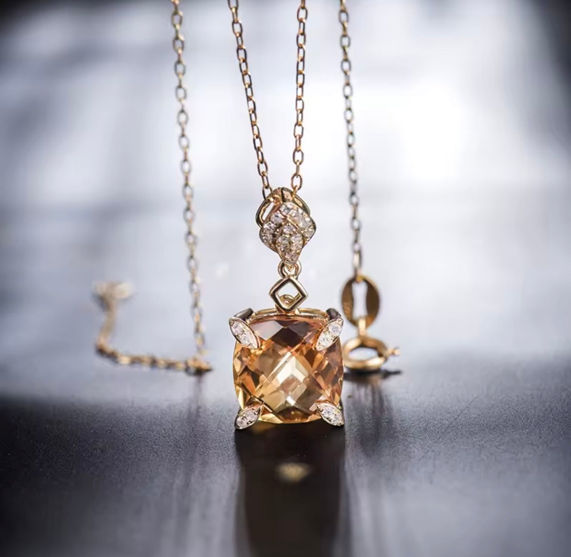 Natural citrine and diamond pendant in 18K yellow gold lifestyle view