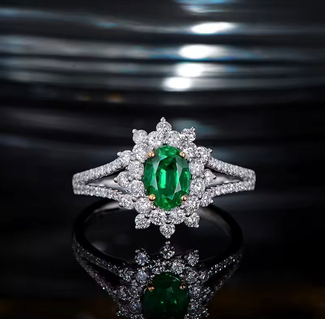 Natural emerald diamond halo ring in solid 14K white gold front view
