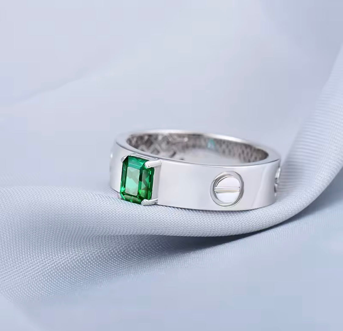 Natural emerald unisex statement ring in 14K white gold side profile