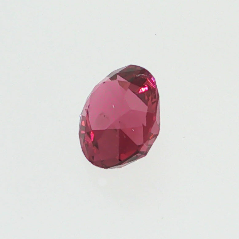 Natural pyrope-almandine garnet, 1.05 carats, oval cut, slightly orangy red color, transparent, ČGL certified gemstone
