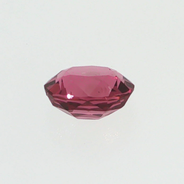 Natural pyrope-almandine garnet, 1.05 carats, oval cut, slightly orangy red color, transparent, ČGL certified gemstone