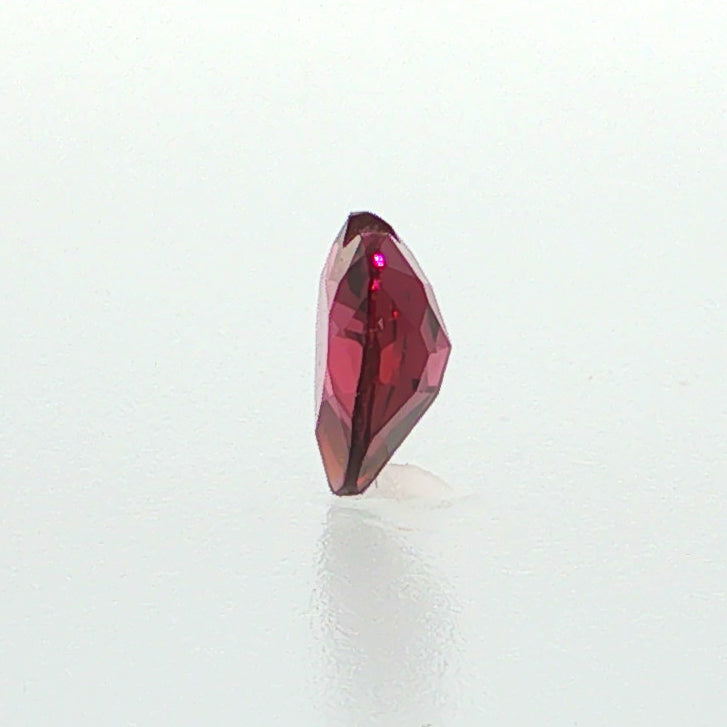 Natural rhodolite garnet, 1.36 carats, heart cut, slightly purplish red color, transparent, ČGL certified gemstone