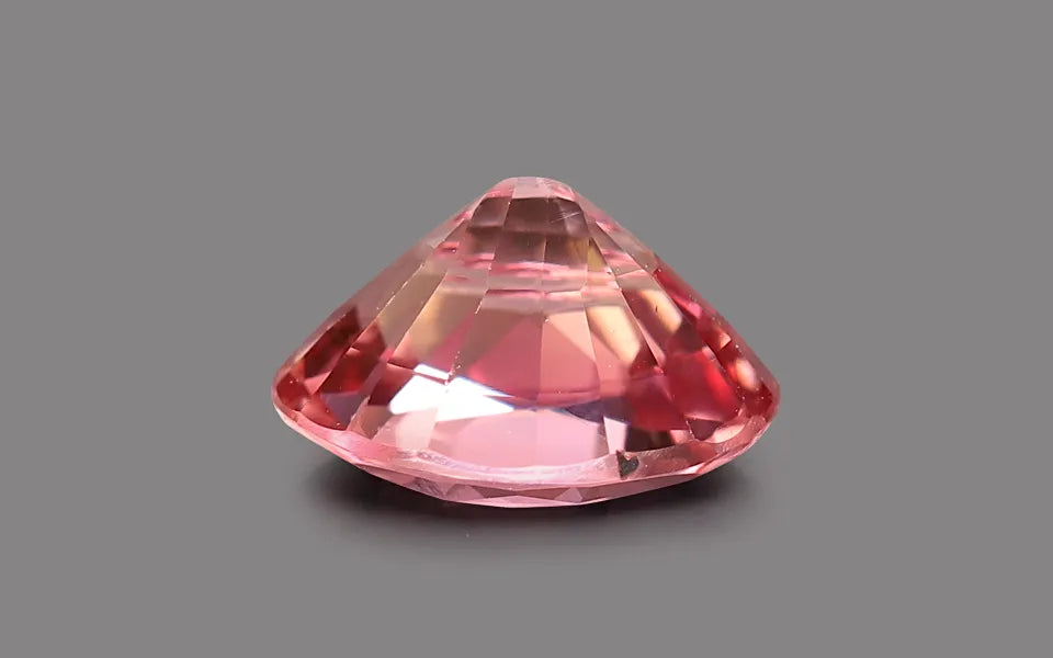 Natural sapphire, orangy pink, oval cut, 1.08 ct, loose gemstone, view 3.