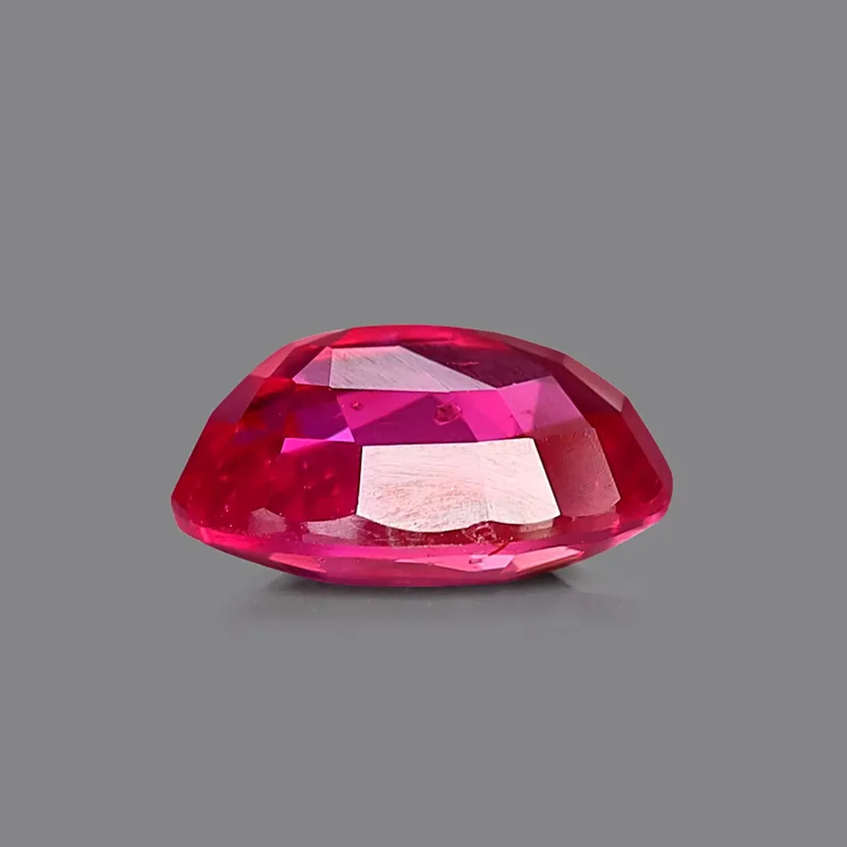 Natural ruby, purplish red, oval cut, 1.54 ct, loose gemstone.