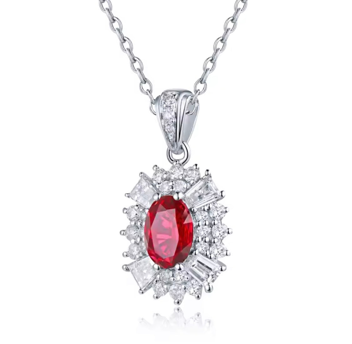 Natural oval ruby with round and baguette diamond pendant in 14K white gold front view