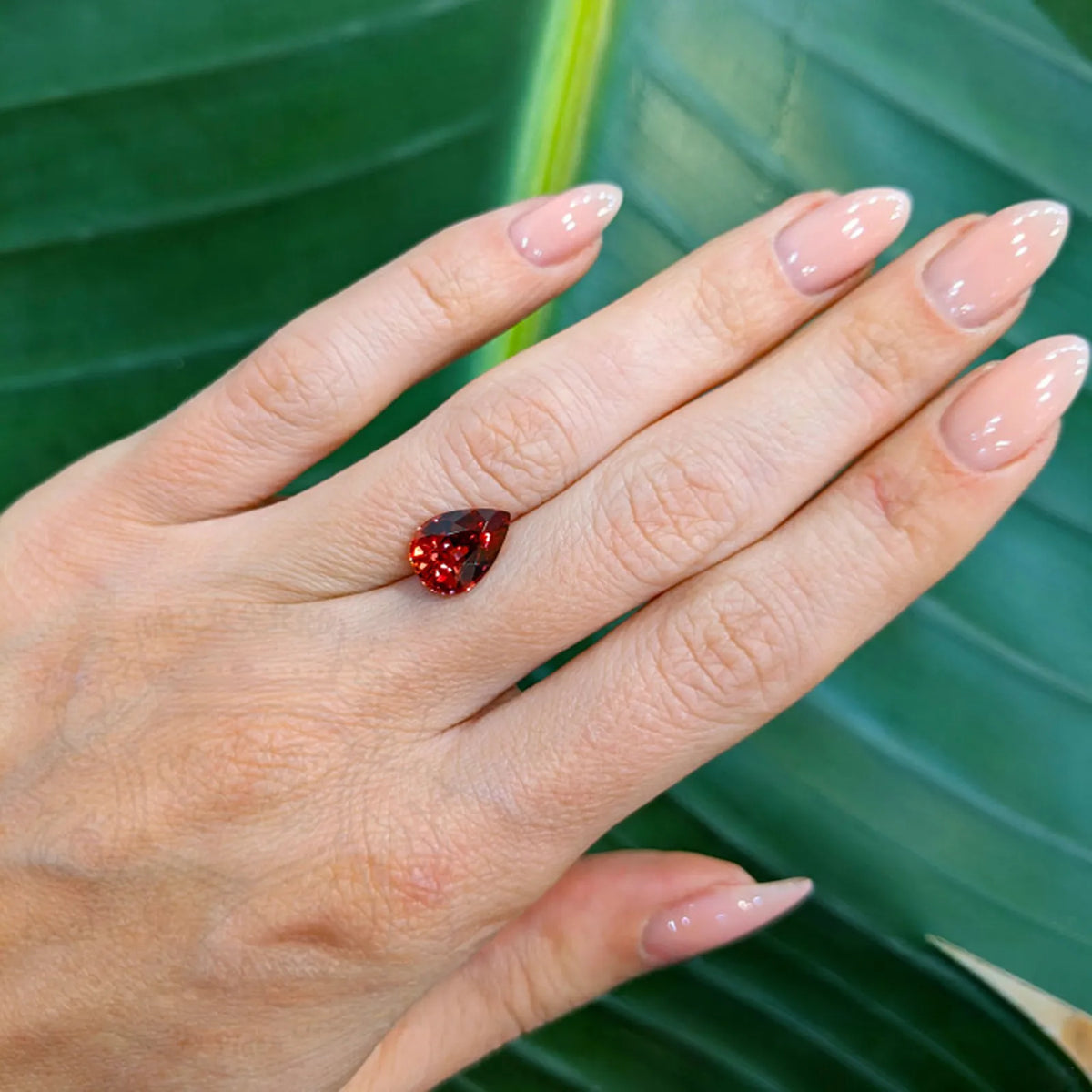 Natural sapphire, padparadscha, pear cut, 3.11 ct, loose gemstone, view 2.