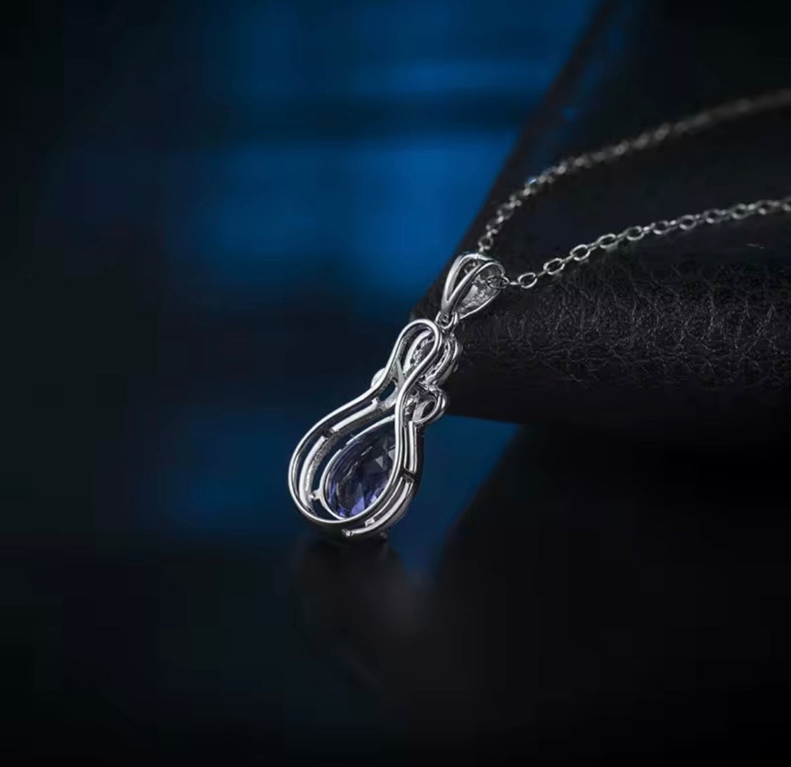14K white gold natural tanzanite diamond pendant back and setting view