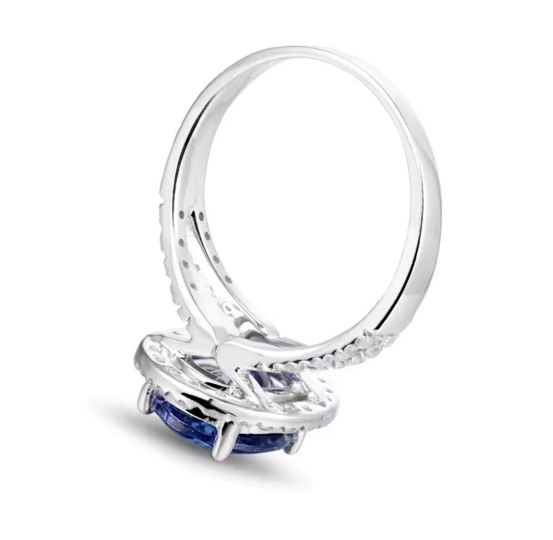 Natural oval tanzanite and diamond ring in 14K white gold side view