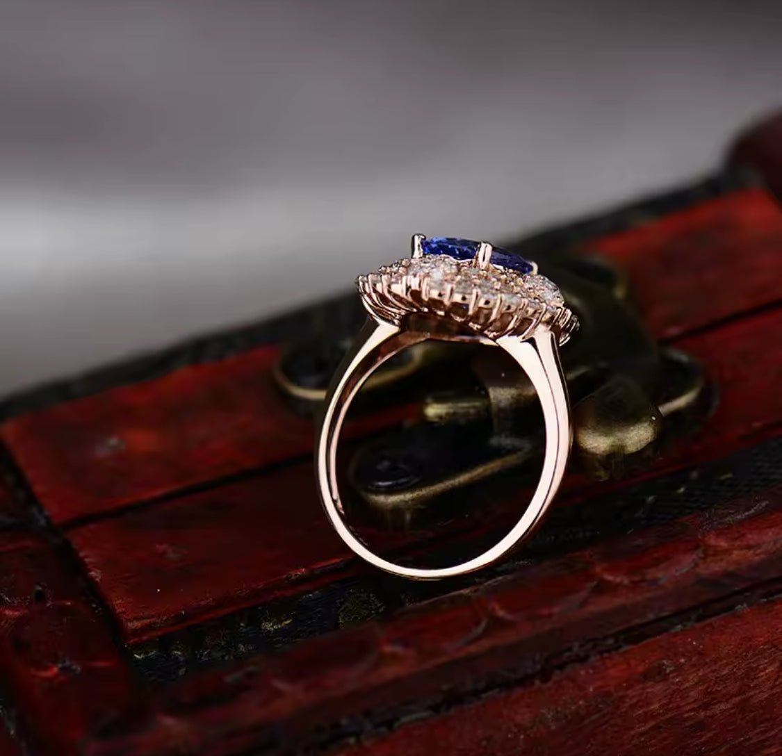 Natural tanzanite diamond ring in 18K rose gold back and setting view