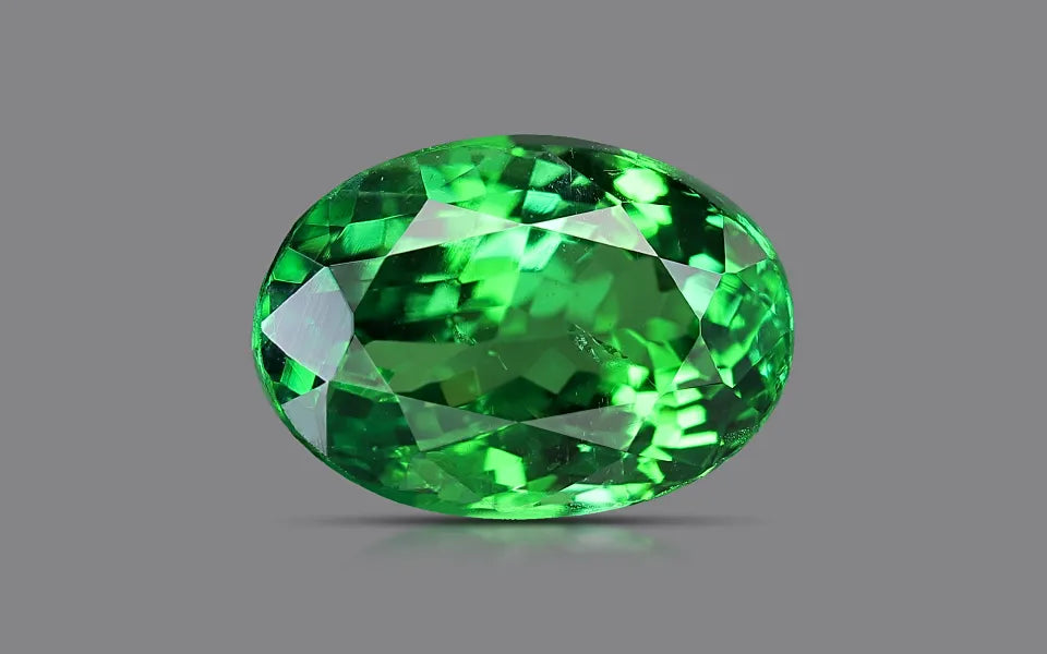 Natural tsavorite, green, oval cut, loose gemstone.