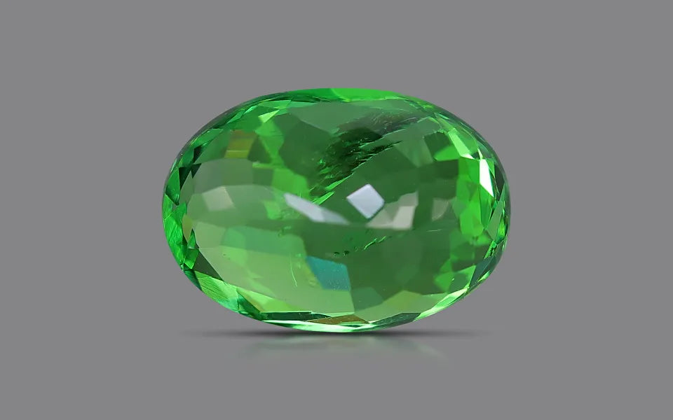 Natural tsavorite, green, oval cut, loose gemstone, view 3.