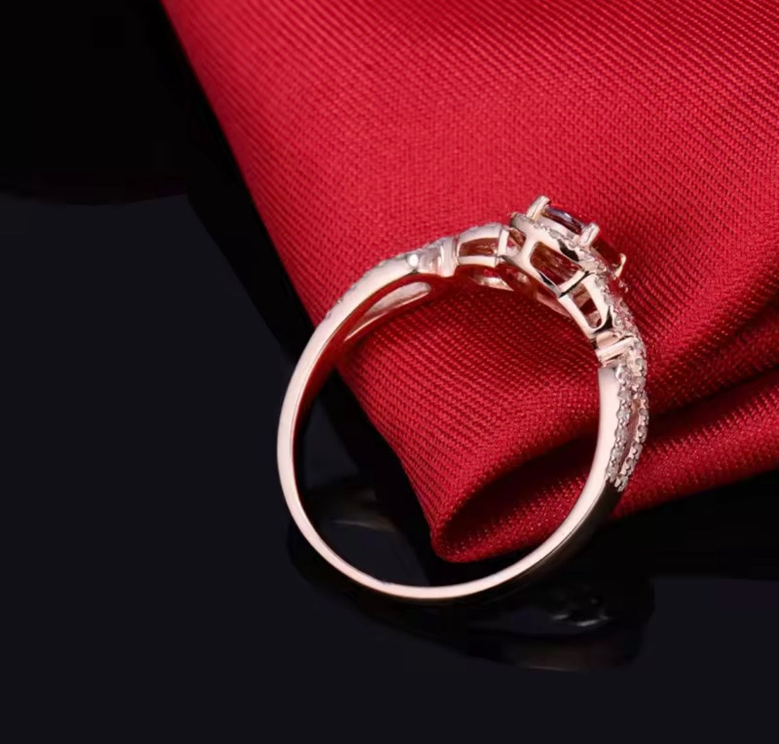 14K rose gold pink tourmaline engagement ring with oval gemstone and diamond halo