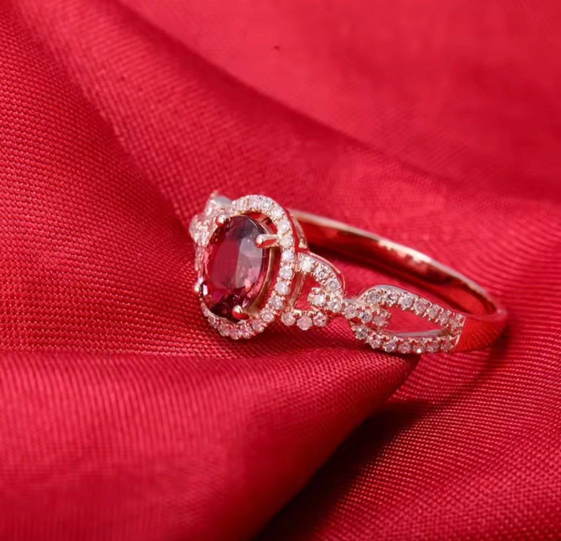 14K rose gold pink tourmaline engagement ring with oval gemstone and diamond halo