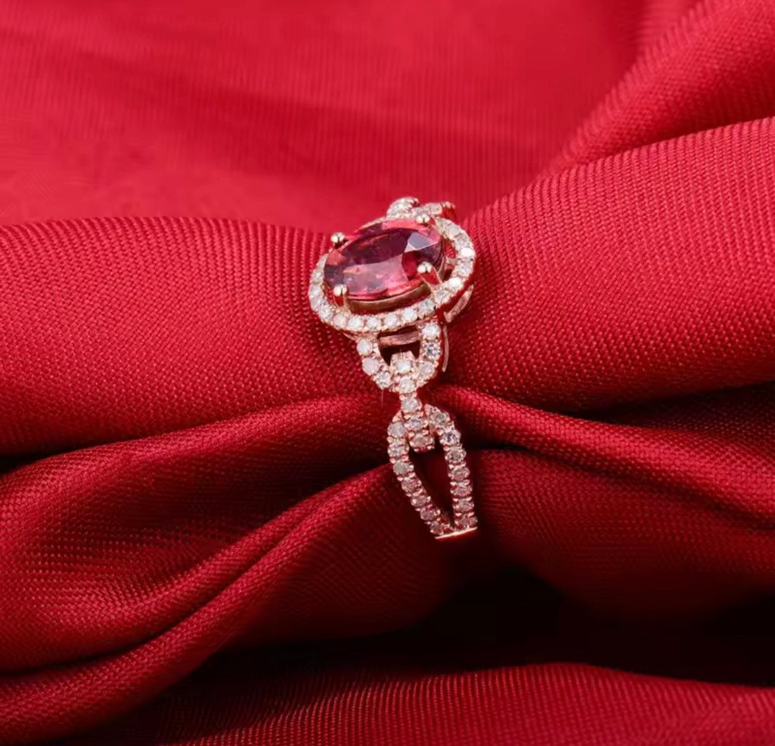 14K rose gold pink tourmaline engagement ring with oval gemstone and diamond halo