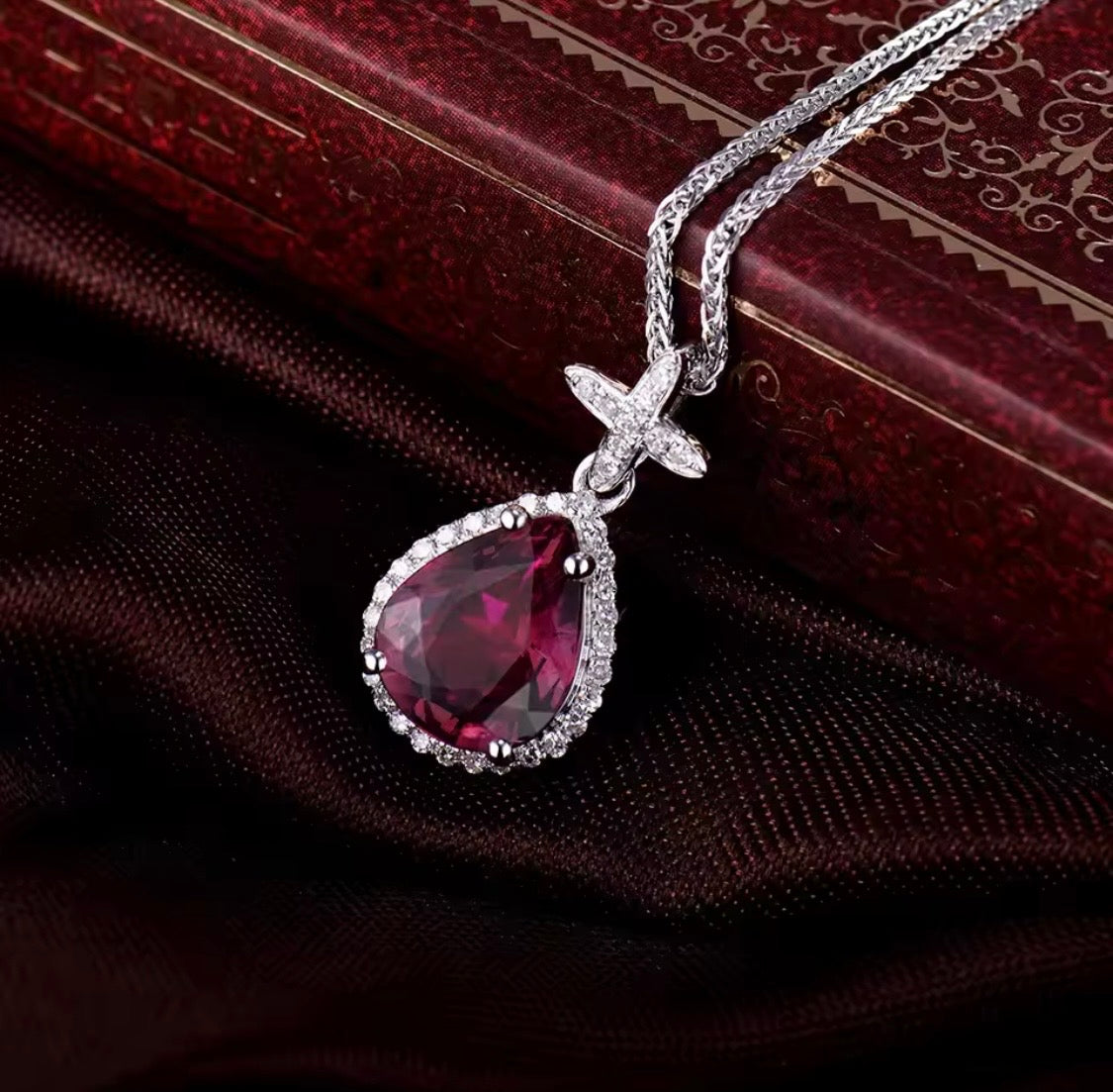 14K white gold pink tourmaline pendant with pear cut gemstone and diamond halo design