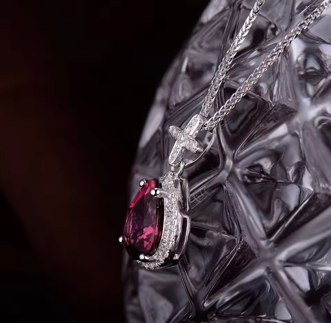 14K white gold pink tourmaline pendant with pear cut gemstone and diamond halo design