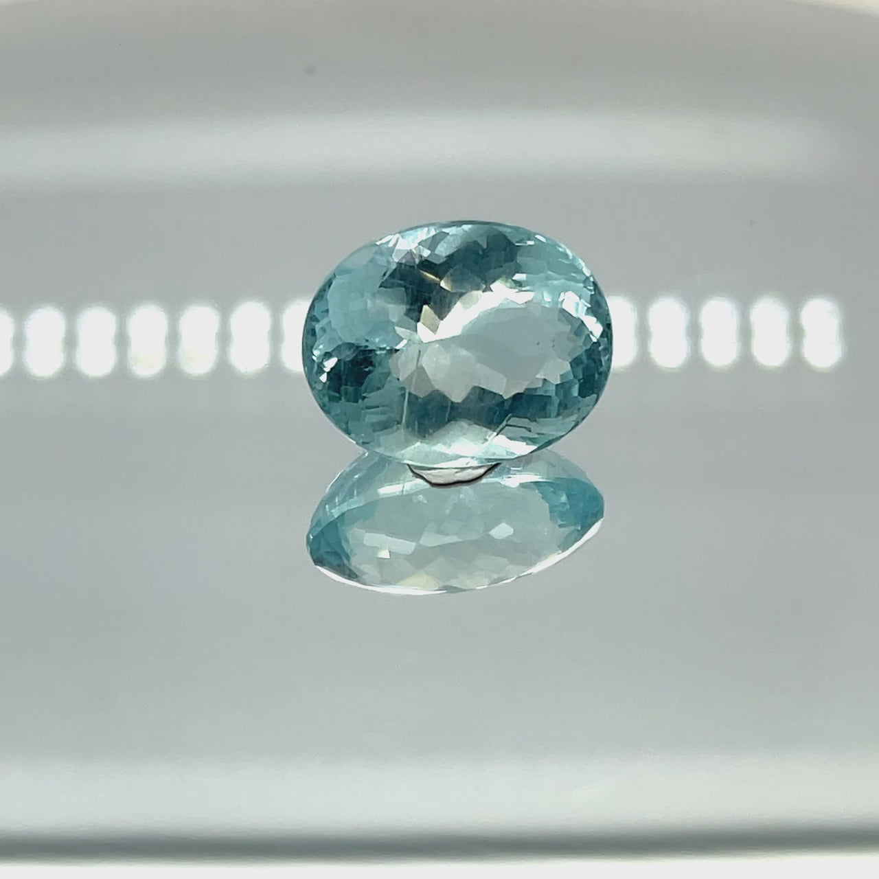 Natural aquamarine, 11.42 carats, oval cut, untreated, vivid blue