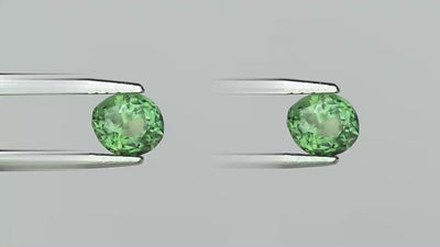Natural Alexandrite 1.02 ct in tweezers