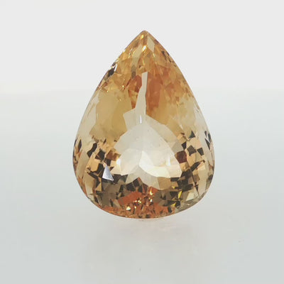 Natural citrine, 61.70 carats, pear cut, eye clean clarity, golden-yellow color, 30.04 × 22.78 × 14.16 mm