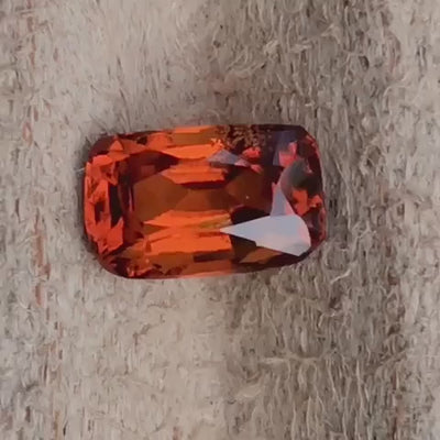 Natural hessonite garnet, 1.31 carats, cushion cut, VS clarity, untreated, fire orange